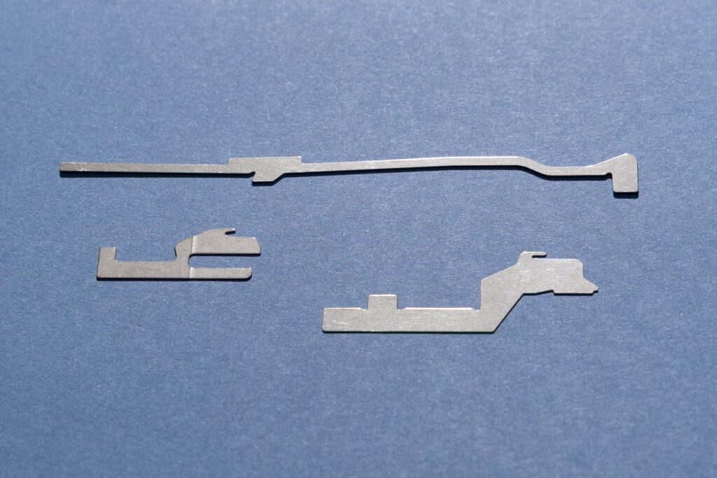 Piece pour machine textile